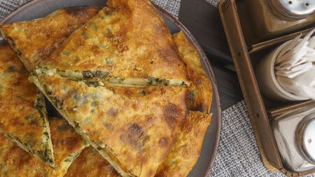 Top view of two Georgian pies. One with cheese, the other with spinach. Traditional Georgian dish khachapuri.の写真素材