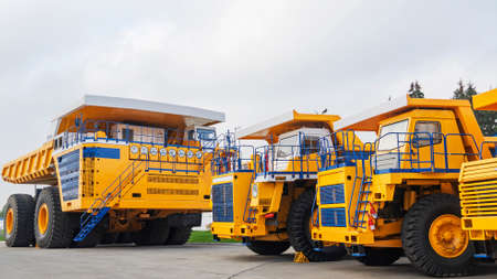 The worlds biggest truck with electric drive system consisting of four electric motors. Mining two-axle all-wheel-drive dump truck with weight-carrying capacity of 450 metric tons.の写真素材
