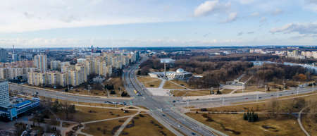 View of the city from above. Residential area in Minsk. Aerial view from drone in winter day.