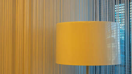 Yellow glowing Lamp for interior decoration. Big electric lamp with yellow light.の写真素材