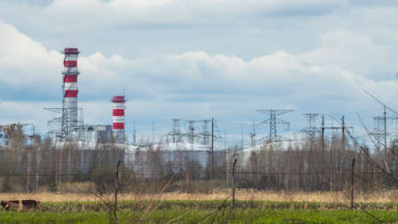Panoramic view of power station Lukomlskaya Gres. Chimneys with smoke of power plant. Ecological problem.の写真素材