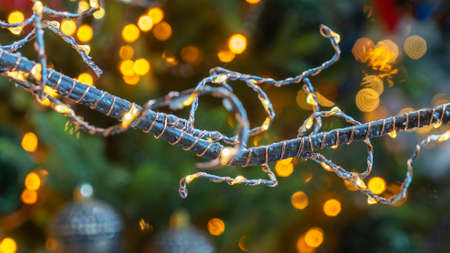 New Year decoration abstract background with ornamental stars, shiny glitters and bokeh light bubbles. Selective focus. Christmas joyful mood. Xmas concepts. Defocused background.の写真素材