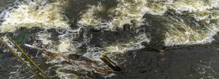 Boiling water in a cold river. Abstract background. Space for text. Nature concepts.の写真素材