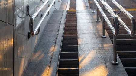 Staircase in the underpass. Staircase to freedom. The rays of the sun on the steps. New life...