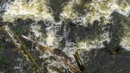 Boiling water in a cold river. Abstract background. Space for text. Nature concepts.