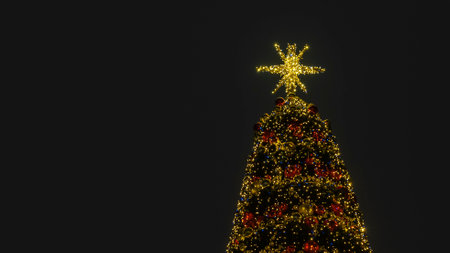 Lights of christmas tree blurred bokeh on dark background with copy space. Abstract festive background. Space for text.の写真素材