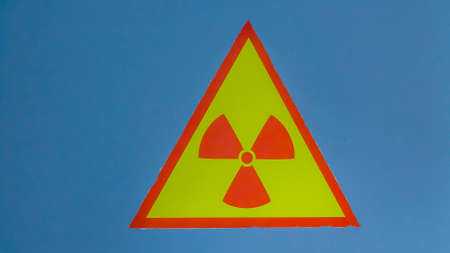 A sign of radiation danger. X-ray room in a medical clinic. Space for text. Warning about the effects of radiation. medical textured.の写真素材