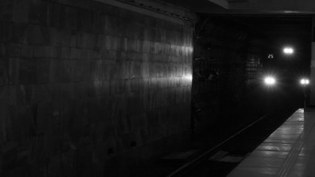 Black and white photo. Moving underground train. The arrival subway train at the station. City without traffic jams.の写真素材