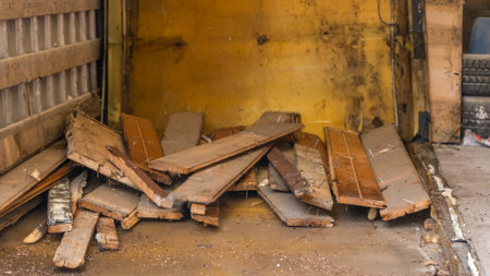 Removal of construction debris. Loading the garbage can waste construction trash dumpsters on house renovation. home renovation.の写真素材
