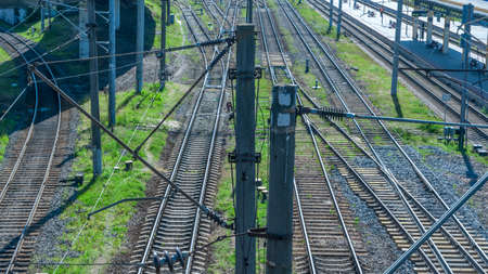 Top perspective view on many railway track lines. Railway, railroad tracks. Cargo and journey...