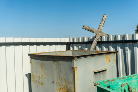 Forgotten Cross: A Weathered Symbol of Loss and Remembrance. Echoes of the Past: An Old Cross...