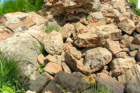 Urban Archaeology Site Showing Layers Of Old Brickwork And Soil In Historical Excavation Area. Uncovering The Past Time Layers And Hidden Stories In Ancient Urban Foundation.の写真素材