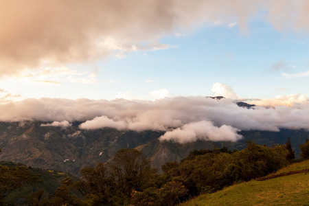 Scenic View Of The Andes Mountains Under Dramatic Sunset Cloudsの写真素材