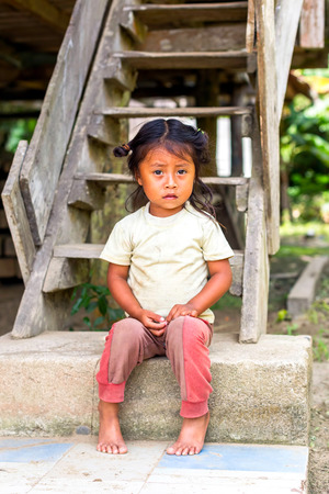 Yasuni, Ecuador - 17 November 2012: Portrait Of Young Indigenous Girl, National Park Yasuni, South America In Yasuni On November 17, 2012のeditorial素材