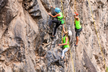 Banos, Ecuador - 30 November 2014: Basalt Challenge Of Tungurahua, Group Of Brave Climbers Climbing A Rock Wall In Banos On November 30, 2014のeditorial素材
