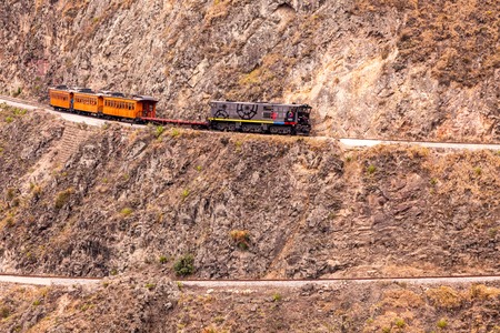 Alausi, Ecuador - 08 December 2011: Train Ride, Devils Nose, Nariz Del Diablo, Ecuador, South America, The Train Follows His Zig Zag Journey Around The Mountainのeditorial素材