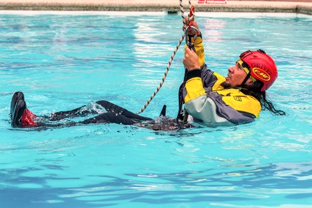 Banos, Ecuador - 23 May 2015: Guide Performing An Exercise Climbing Rescue Using Rope Techniques,...