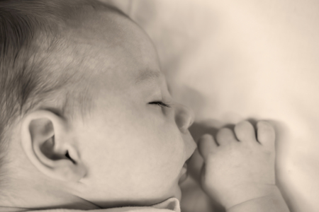 Sweet Little Newborn Baby Boy Sleeping On The Blanket, Monochrome Shootの写真素材