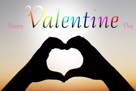 Happy Valentine's Day with Silhouettes of love couple ceramic on sunset background