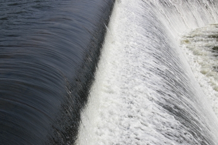 Building a man-made dam. To store water for the dry season, there are many large and small scale by local conditions and terrain.の写真素材