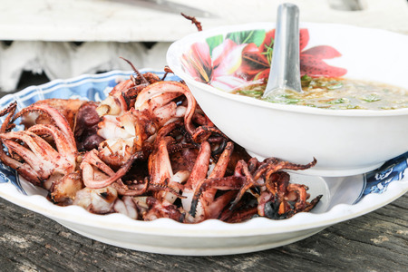 Grilled squid is a favorite of many people. Delicious taste Be made ââin a variety of dishes to please the people around the world.の写真素材