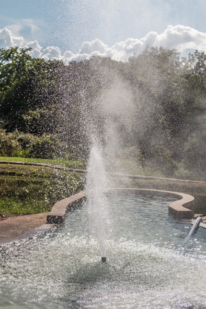 Spring water is caused by man. Or spontaneous by nature. Is beautiful It is the resting place of the common people.の写真素材