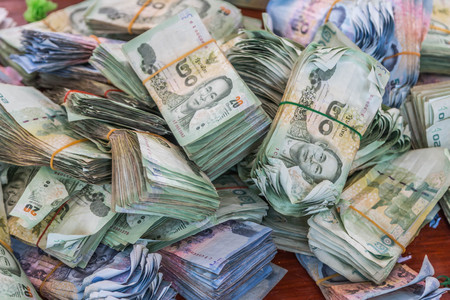 Money means any material or documents that are generally accepted in exchange for goods and services. And settlements in a country or in a particular socio-economic context.の写真素材