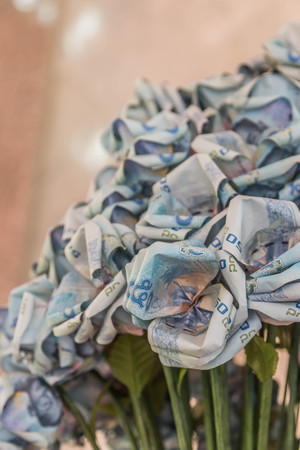 Money means any material or documents that are generally accepted in exchange for goods and services. And settlements in a country or in a particular socio-economic context.の写真素材