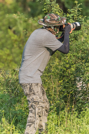 A photographer or photographer is a person skilled in photography using a camera. May be classified as an artist. Because the photographer can place elements.の写真素材