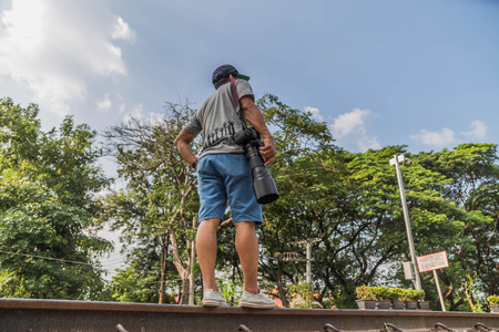 A photographer or photographer is a person skilled in photography using a camera. May be classified...