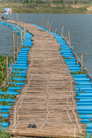 The bridge is a structure that connects the side for over a river valley in road, railway and water. The height of the bridge designの写真素材