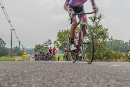 CHACHOENGSAO, THAILAND - APRIL 3:People who do not know many cyclists in the race.April 3, 2561. Chachoengsao Province. Thailand.のeditorial素材