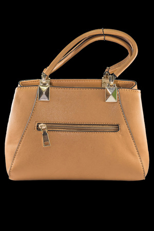 Woman's handbag isolated on black backgroundの写真素材
