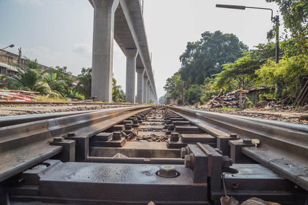 Train   is a group of vehicles that travel along the rails to the transport of goods or passengers from one place to another. Most tracks usually consist of two parallel rails.の写真素材