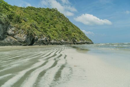 The beach is sloping into the water or the shallow hills are in the middle of the water. By a lot of sand dunes Always change shape. It is a constantly changing environment.の写真素材