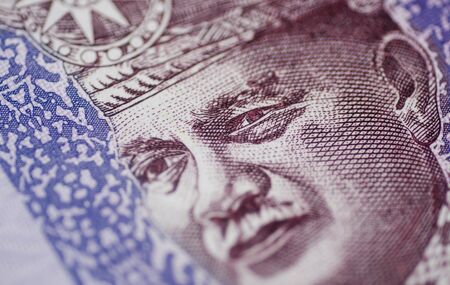 Malaysia currency of Malaysian ringgit banknotes background. Paper money of Hundred ringgit notes on etreme closeup. Financial concept.の写真素材