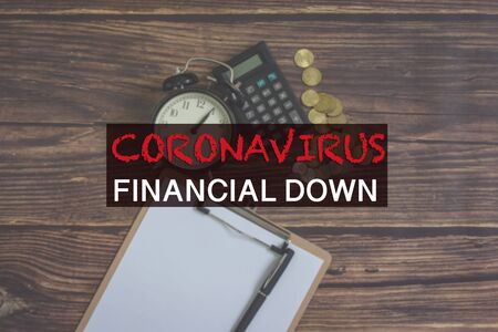 Financial accounting, money ,calculator, table watch and noted pad with pen on tableの写真素材