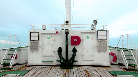 heavy anchor locate at the bow of the deep sea fisheries shipの写真素材