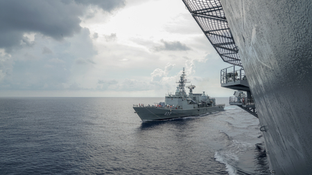 CHONBURI, THAILAND - MAY 18, 2016 : HTMS Taksin replenishs at sea (RAS, Replenishment at sea) with HTMS Chakri Naruebet aircraft carrier of Royal Thai Navy.のeditorial素材