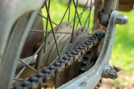 Dirty chain of vintage grey Japanese motorcycleの写真素材