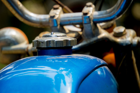 Blue fuel tank and silver cover of vintage Japanese motorcycleの写真素材