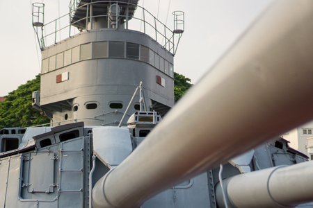SAMUT PRAKAN, THAILAND - MARCH 24, 2018 : Super structure and gun turret  of 80 years old HTMS Thonburi at Royal Thai naval academy historic park.のeditorial素材