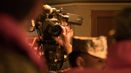 PATTANI, THAILAND - APRIL 7, 2016 : Royal Thai navy combat cameraman from Civil affair department shoot a movie of naval operation on board navy ship on April 7, 2016 in Pattani, Thailand.のeditorial素材