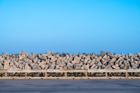 Tetrapods breakwater, a structure in coastal engineering used to prevent erosion caused by sea wave and strong wind and protect ships in harbour.の写真素材