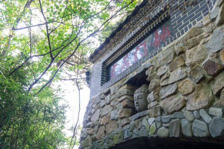 BUSAN, SOUTH KOREA - JULY 20, 2017 : Buddha head decorate on the entrance of the Haedong Yonggungsa Temple  in Busan, South Korea.のeditorial素材