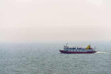 BUSAN,SOUTH KOREA - JULY 20, 2017: Haeundae cruise speed ferry sail across the sea in Haeundae, Busan South Korea.のeditorial素材