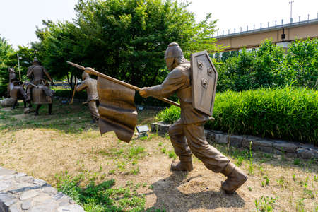 GIMHAE, SOUTH KOREA - JUNE 18, 2017 : Replica of Gaya Dynasty troops bronze statue in Gimehae, South Gyeongsang province, South Korea.のeditorial素材