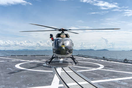 CHONBURI, THAILAND - JULY 9, 2020: The Eurocopter EC 645 T2  helicopter lands on the flight deck of...