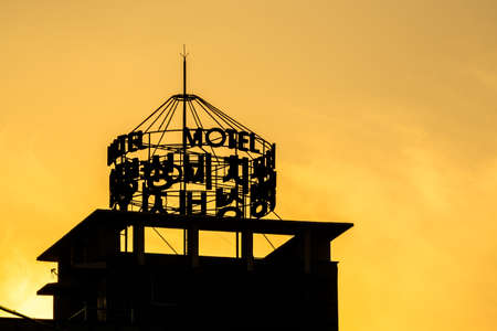 GEOJE, SOUTH KOREA - JUNE 15, 2017: Silhouette of Motel sign on the top of the building in Okpo, Geoje island, South Korea.のeditorial素材