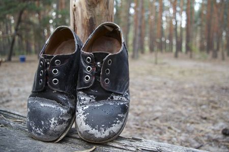 Black old bootsの写真素材